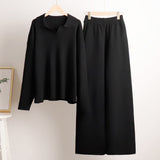 Indy | Damski dres z oversize polo swetrem i szerokimi spodniami w kolorze piaskowym